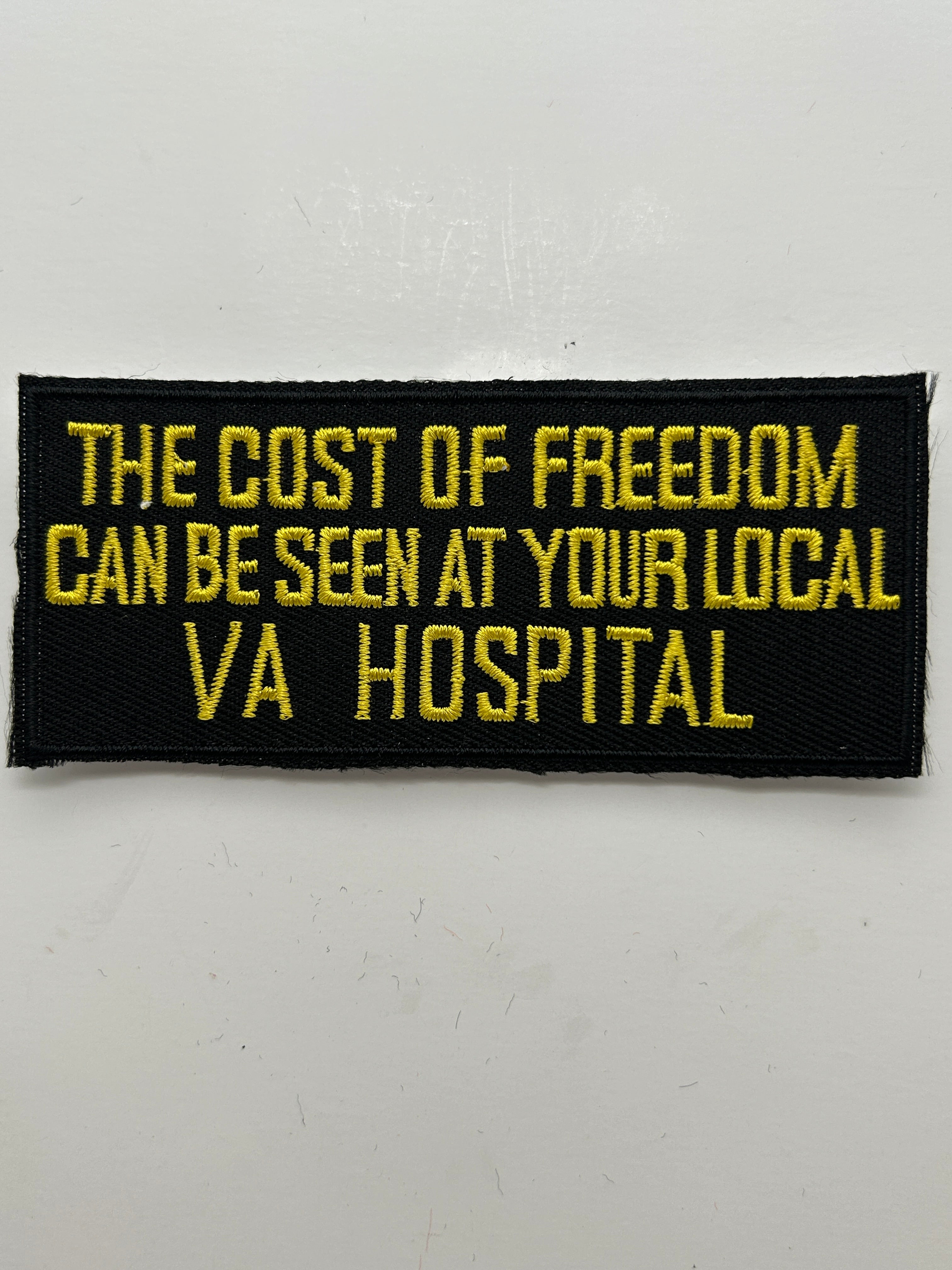 US Veteran Favorites "The cost of freedom can be seen at your local VA Hospital" Black Patch | Military Hats & Pins