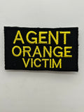 US Veteran Favorites "AGENT ORANGE VICTIM" Black Patch | Military Hats & Pins