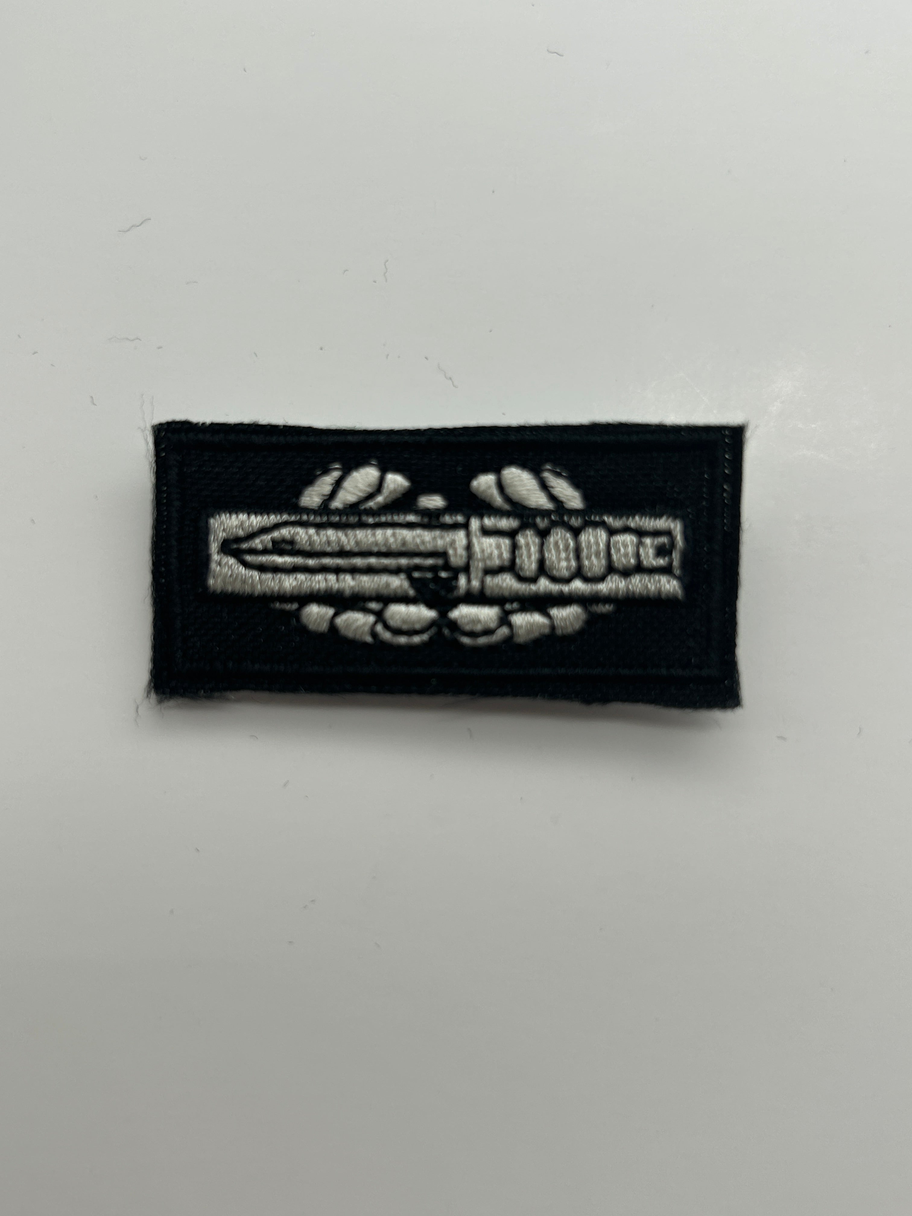 US Military Tabs and Tiny Logo 1 1/2 : Combat Action Badge | Military Hats & Pins